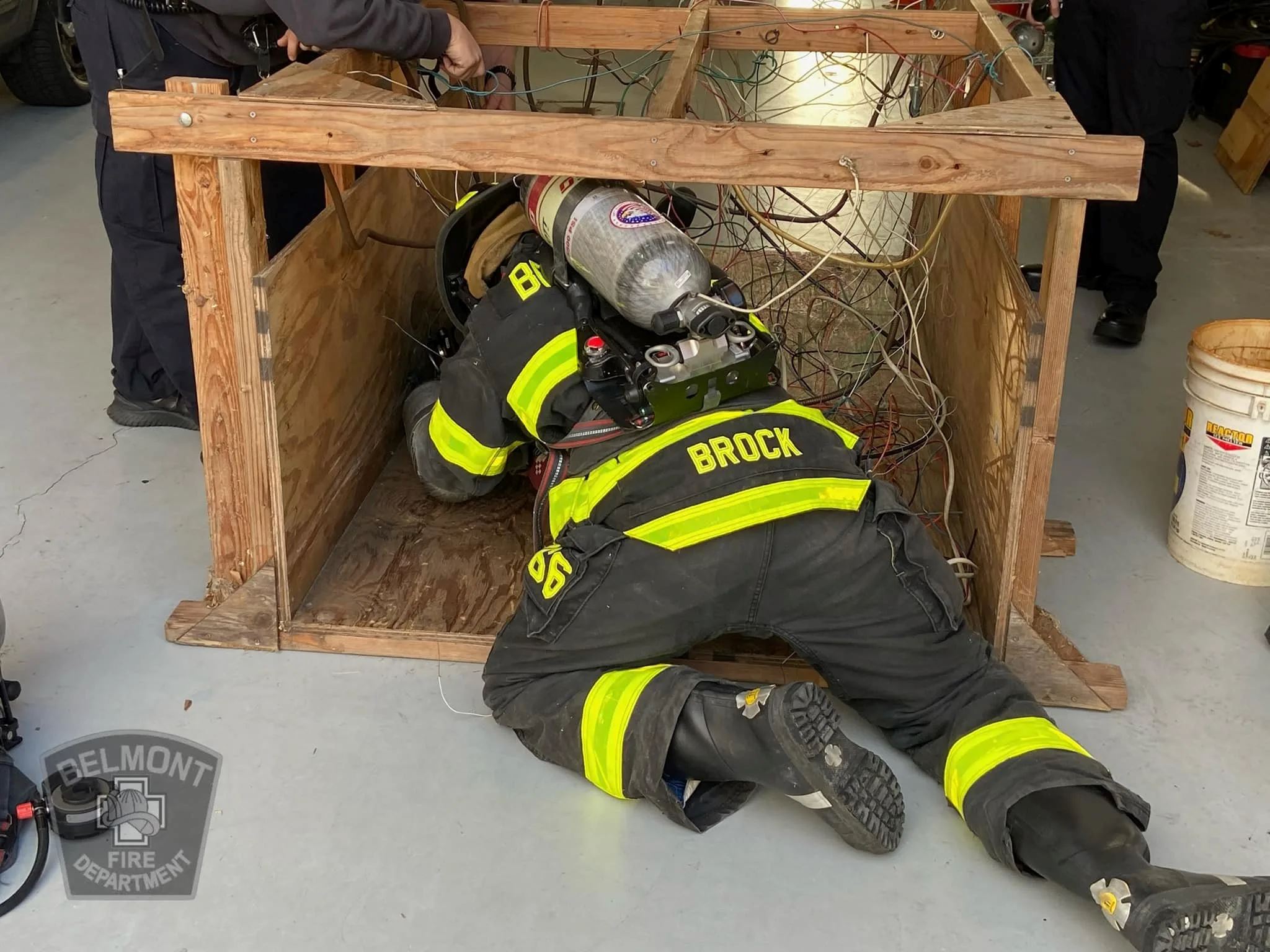 Firefighter Trains in Wire Work