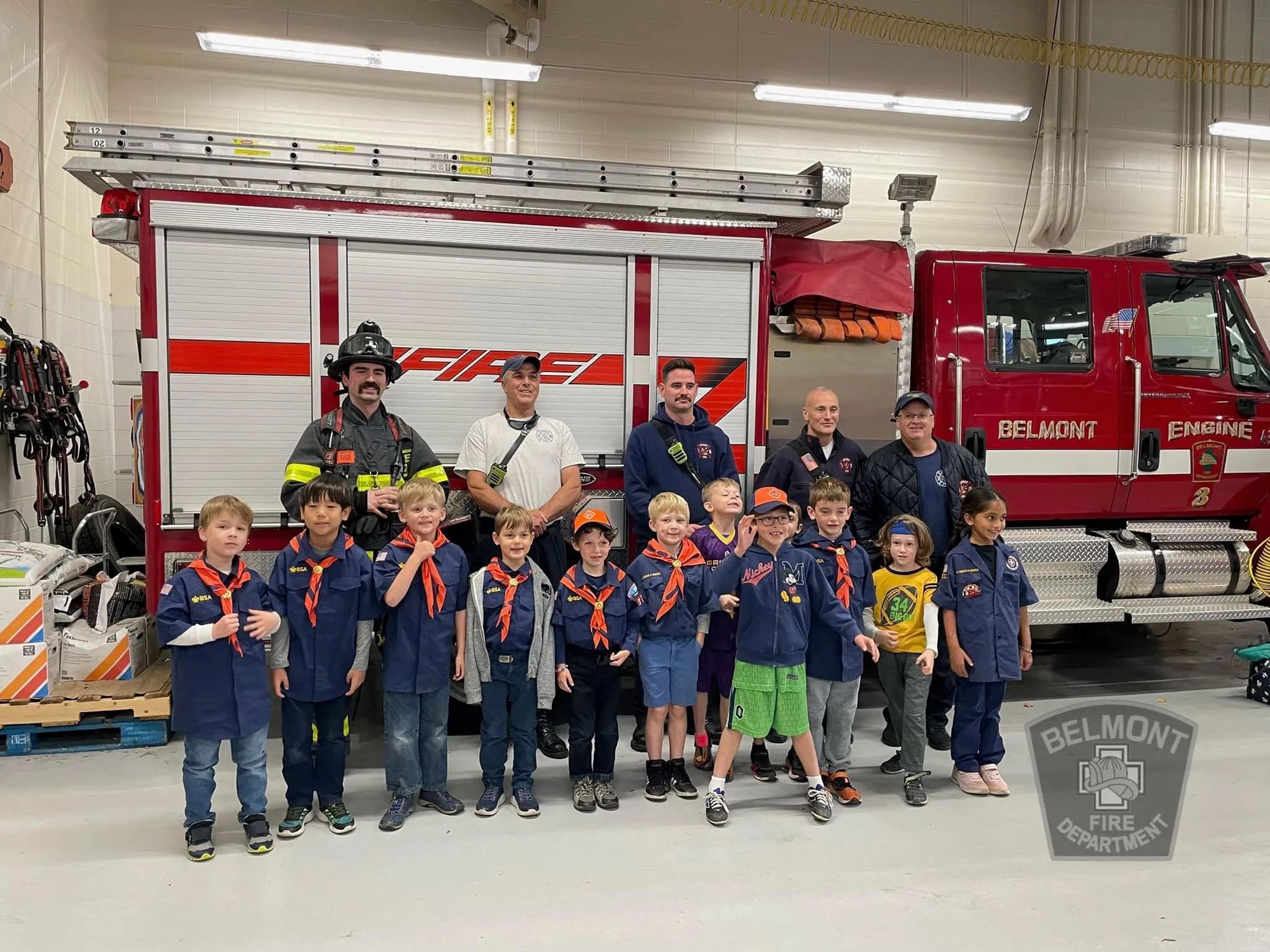 Group of Scouts Stand with Belmont Firefighters in Front of Engine 3